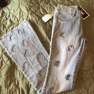 Jeans with cut out circles
